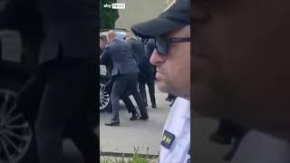 Slovakia's PM bundled into car after being shot