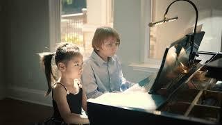 Elisey Mysin and 5-years-old Yutong play ice waltz