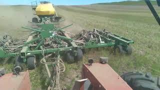 June 9th, seeding soybeans with 1895 drill and the 9270