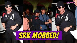 Shah Rukh Khan Gets Mobbed By Fans, Bodyguard Comes To His Rescue As He Leaves For Abu Dhabi | WATCH