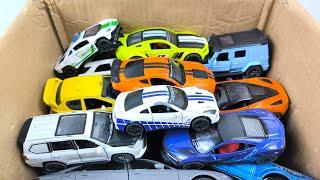 Box Full of Model Cars -Mazda Mx5, Koenigesgg Jesko, Lamborghini Scv12, Byd Yang Wang U8, Toyota Car