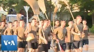 Chinese Army Arrives to Hong Kong to Clean-up After Protests