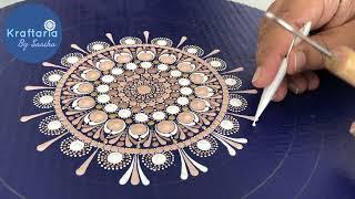 Dot mandala painting on a 15 inch circular cardboard. Intricate dot mandala painting.