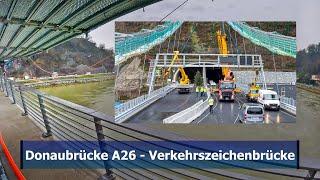 donaubrücke a26: verkehrszeichenbrücke montiert