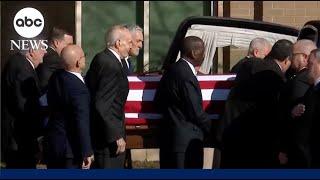 Former President Jimmy Carter's casket is transferred to Atlanta