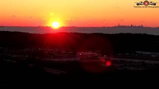 Sun setting beside Chicago watching across Lake, Michigan Hyper-Lapse Drone Footage July 12 2020