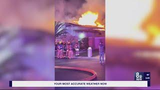 Neighbor describes rushing to scene of west Las Vegas valley house fire