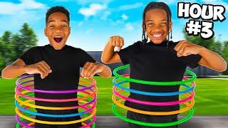 LAST PERSON TO STOP HULA HOOPING WINS!