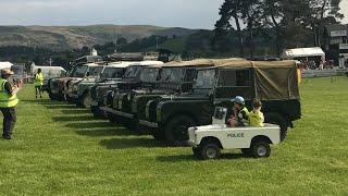 Police Toylander Leads Convoy Of Land Rovers Into Arena At The Welsh Festival Of Land Rovers