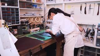 A day in the life of a female leather craftsman making leather bags in the shop she built herself