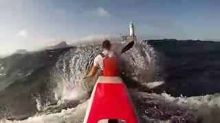 Dawid Mocke goes downwind past Roman Rock Lighthouse