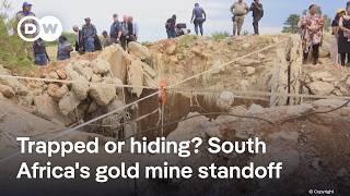 Families urge authorities to rescue illegal gold miners in South Africa | DW News