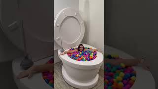 Going Under in Worlds Largest Toilet SURPRISE EGG Pool #shorts