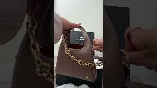 A little commotion for the #Coach new bag + charms. Coach Lana 23 —perfect for on the go! #unboxing