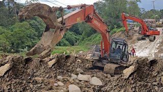 Excavator like going berserk, Batu Jomba incline is messed up