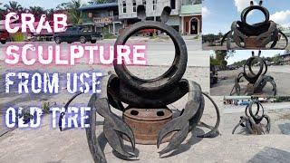 crab sculpture from used old tire