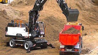 Huge RC Construction Site Wheel Excavator Trucks Fire Engines / Modellbaumesse Friedrichshafen 2024