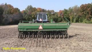 Sowing a covercrop of wheat with a Ford 8630 and a Great Plains notill drill.