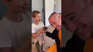 Robert Downey Jr shaves head with the help of his kids