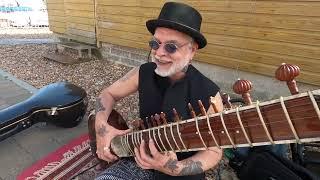 Yaman Sitar in Brighton Beach. UK. 2022. 4K