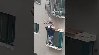 Neighbours rescue boy dangling from 4th-floor window in China #ytshorts