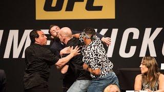 Kevin Lee punches Michael Chiesa at UFC Press Conference