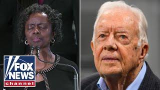 Former President Carter’s friend offers a prayer during funeral service