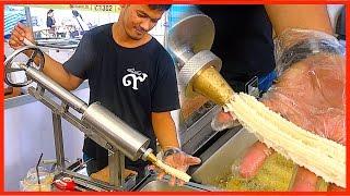 Street food - Magic Making Machine Doughstick with Teh Tarik in Dessert Event