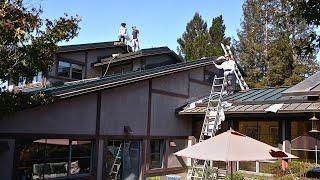 Stucco repairs after new metal roofs installed