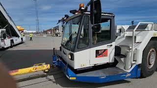 How to connect the TOWBAR to the NOSE WHEEL of the BOEING 747 before PUSH BACK