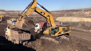 Caterpillar 385C Excavator Loading 4 Axle Trucks On Huge Mining Area - Labrianidis Mining Works