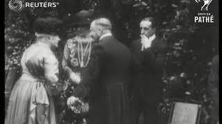 Spanish king and queen at charity fete (1920)