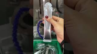Shaped pouches filling packing machine for liquid
