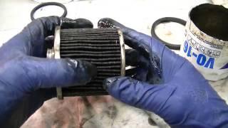 Older Fram and Valvoline Used Oil Filter Inspection