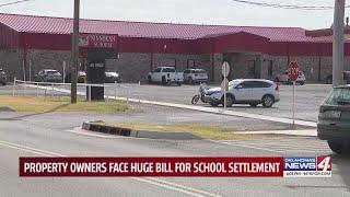 Property owners face huge bill for school settlement