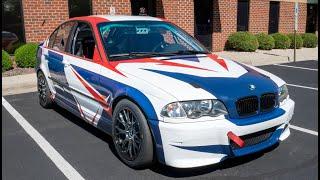 Custom design and Full wrap for this BMW 330 Race Car .