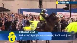 Newcastle fan punches police horse: supporters clash with police after Sunderland defeat