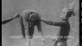 Man jumping through hoop 1930 archival footage  PublicDomainFootage.com