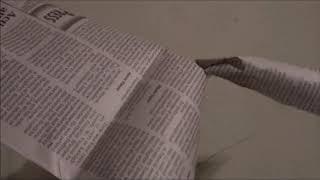 10 Hours of Tearing a Newspaper (Slow)