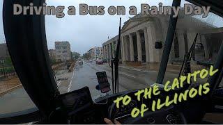 Driving a bus on a rainy day | To Springfield IL for a School field trip.