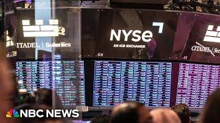 Dow, S&P 500 close at record high after Fed interest rate cut