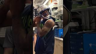 The guys try on their Throwback helmets. | Seahawks Shorts