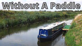 277. Narrowboat cruising up a creek in Cambridgeshire