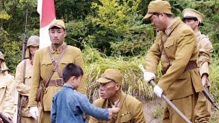 Japanese troops sweep through the village, only to encounter fearless guerrillas, retribution comes.