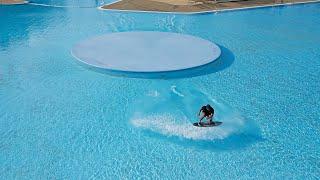 Sliding across a GIANT Pool on a Skimboard!