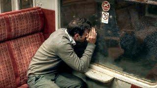 The Train Suddenly Stopped, and the Man Froze, Afraid to Move, Staring Out the Window