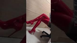 Red thigh high boot