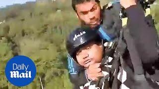 Hero pilot saves man after their paraglider SNAPS mid air