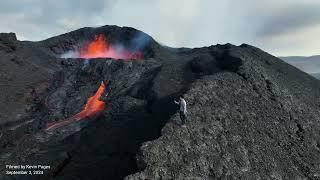 Tourist spotted on top of erupting volcano in Iceland! Hiked across hot lavafield to get there! REAL