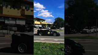 Black Ferrari F50 is so fast that its driver misses the hotel entrance!